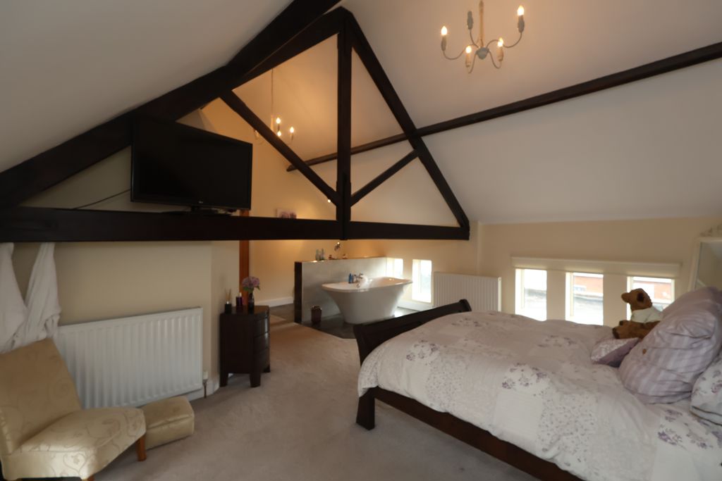 Bedroom One- click for photo gallery
